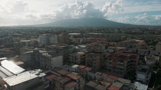 Aerial view of urban rooftops and Mount Vesuvius Italy. Aerial view of urban rooftops and Mount Vesuvius Italy.