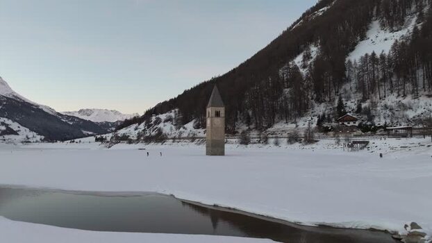 Aerial view of the submerged church tower in Graun im Vinschgau Italy. Aerial view of the submerged church tower in Graun im Vinschgau Italy.