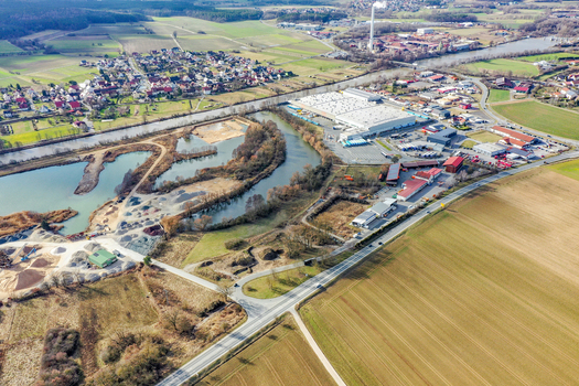 Aerial view of the town of Forchheim with the river canal industrial buildings and vast agricultural fields Forchheim Bavaria Germany. Aerial view of the town of Forchheim with the river canal industrial buildings and vast agricultural fields Forchheim Bavaria Germany.