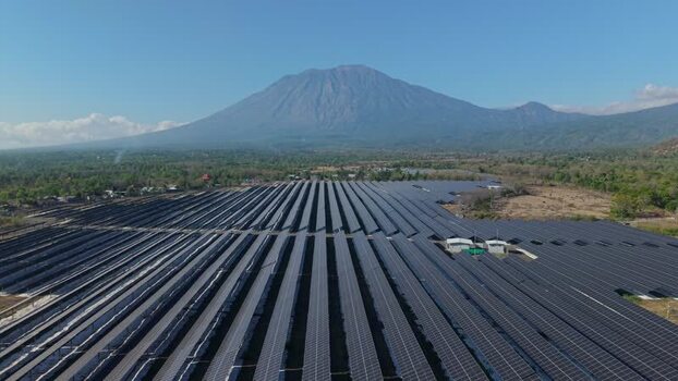 Aerial view of PLTS Bali Timur solar farm in Indonesia. Aerial view of PLTS Bali Timur solar farm in Indonesia.