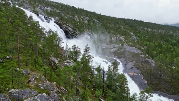 Aerial view of Kjemafossen waterfall in Nordland Norway.