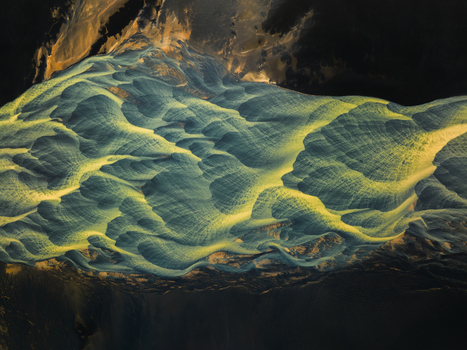 Aerial view of glacial rivers carve serpentine paths through the volcanic landscape Iceland creating an otherworldly tapestry of colors and textures Iceland Iceland. Aerial view of glacial rivers carve serpentine paths through the volcanic landscape Iceland creating an otherworldly tapestry of colors and textures Iceland Iceland.