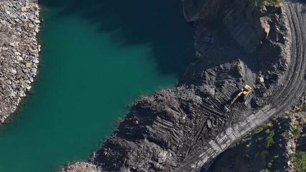 Aerial view of excavator in a quarry Portugal.