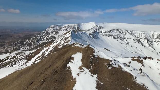 Aerial view of hikers on the Moskardshnjukar Trail ridge Iceland. Aerial view of hikers on the Moskardshnjukar Trail ridge Iceland.