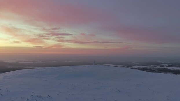 Aerial view of Luosto fell under a pink sunrise sky Finland. Aerial view of Luosto fell under a pink sunrise sky Finland.