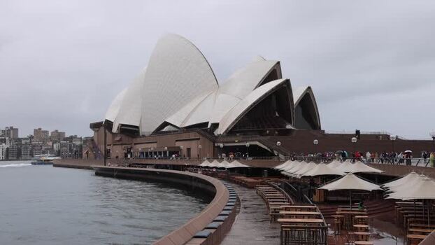 View of Sydney Opera House and waterfront promenade Australia.