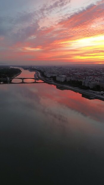 Aerial view of the Danube River at sunset in Budapest Hungary.