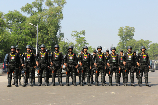 Dhaka Bangladesh 08 January 2017 View of Rapid Action Battalion RAB officers in black tactical uniforms and helmets standing in formation at the RAB Headquarters. Dhaka Bangladesh 08 January 2017 View of Rapid Action Battalion RAB officers in black tactical uniforms and helmets standing in formation at the RAB Headquarters.
