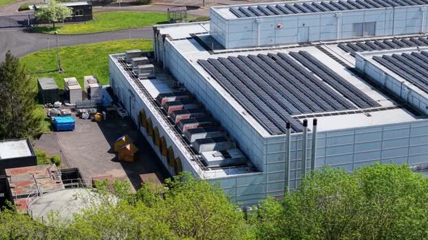 Aerial view of a data center with solar panels United Kingdom. Aerial view of a data center with solar panels United Kingdom.