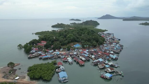 Aerial view of stilt houses on Batam Island Indonesia. Aerial view of stilt houses on Batam Island Indonesia.