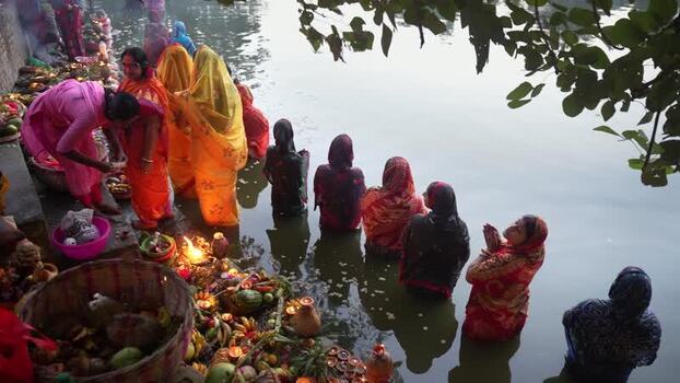 View of women performing religious rituals in water Bangladesh. View of women performing religious rituals in water Bangladesh.