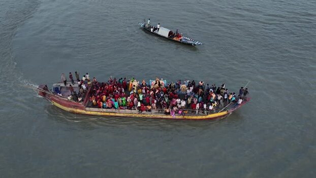 Aerial view of a crowded ferry boat on a river Bangladesh.