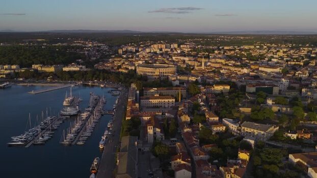 Aerial view of Pula Arena and harbor at sunset Croatia. Aerial view of Pula Arena and harbor at sunset Croatia.
