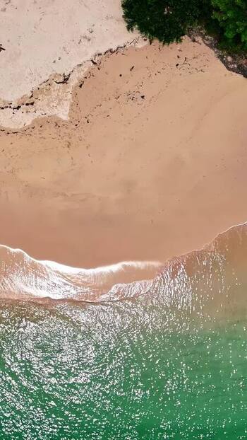 Aerial view of sandy beach in Bali Indonesia.