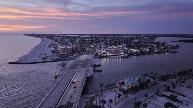 Aerial view of John s Pass Village and bridge at sunset United States. Aerial view of John s Pass Village and bridge at sunset United States.