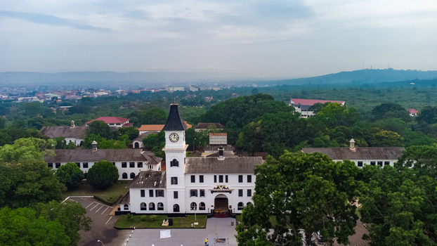 Aerial view of the historic Achimota School with its iconic clock tower white colonial style buildings and lush green surroundings in Achimota Greater Accra Region Ghana. Aerial view of the historic Achimota School with its iconic clock tower white colonial style buildings and lush green surroundings in Achimota Greater Accra Region Ghana.