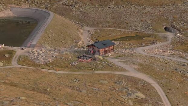 Aerial view of a mountain hut near Aletsch Glacier Switzerland.