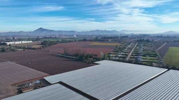 Aerial view of agricultural fields and greenhouses Chile.