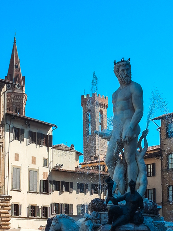 Florence Italy 26 April 2026 View of the Fountain of Neptune in Piazza della Signoria featuring the marble statue of Neptune surrounded by historic buildings and a clear blue sky. Florence Italy 26 April 2026 View of the Fountain of Neptune in Piazza della Signoria featuring the marble statue of Neptune surrounded by historic buildings and a clear blue sky.