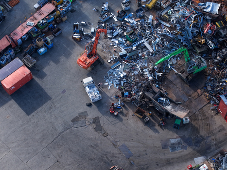 Melbourne Australia 22 September 2026 Aerial view of a scrap metal recycling facility in Kilsyth with excavators sorting piles of metal shipping containers and industrial equipment. Melbourne Australia 22 September 2026 Aerial view of a scrap metal recycling facility in Kilsyth with excavators sorting piles of metal shipping containers and industrial equipment.