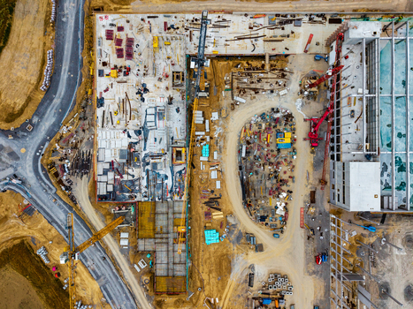 Aerial view of the Neuenstein Techno Zone construction site featuring cranes building foundations and construction materials in Neuenstein Baden Wurttemberg Germany. Aerial view of the Neuenstein Techno Zone construction site featuring cranes building foundations and construction materials in Neuenstein Baden Wurttemberg Germany.