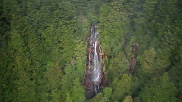 Aerial view of waterfall in Patagonian forest Chile. Aerial view of waterfall in Patagonian forest Chile.