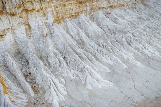 Aerial view of the white chalk cliffs and eroded landscape of Tuzbair in the Mangystau District Mangystau Region Kazakhstan.