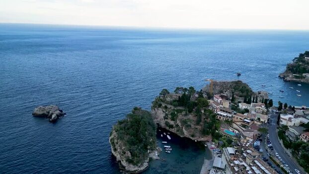 Aerial view of the coastline and Isola Bella Italy.