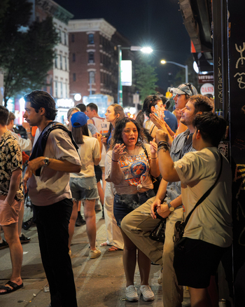 Williamsburg New York USA 14 June 2026 View of enthusiastic basketball fans celebrating the Knicks NBA championship victory on a crowded sidewalk at night. Williamsburg New York USA 14 June 2026 View of enthusiastic basketball fans celebrating the Knicks NBA championship victory on a crowded sidewalk at night.