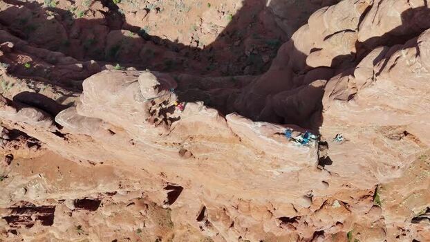 Aerial view of climbers on the red rock ridges of Fisher Towers United States. Aerial view of climbers on the red rock ridges of Fisher Towers United States.