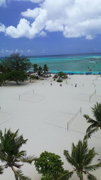 Aerial view of Grand Cayman beach with volleyball nets Cayman Islands. Aerial view of Grand Cayman beach with volleyball nets Cayman Islands.