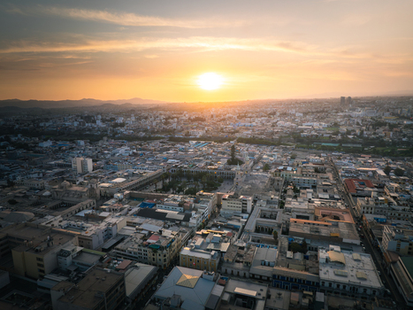 Aerial view of the historic city center of Arequipa with colonial architecture and the Plaza de Armas illuminated by the warm golden hour light at sunset in Arequipa Arequipa Peru. Aerial view of the historic city center of Arequipa with colonial architecture and the Plaza de Armas illuminated by the warm golden hour light at sunset in Arequipa Arequipa Peru.