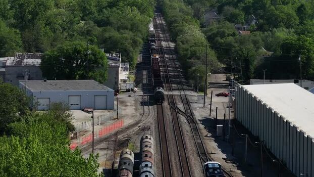 Aerial view of freight train cars on tracks United States. Aerial view of freight train cars on tracks United States.