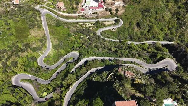Aerial view of a winding mountain road in Savoca Italy. Aerial view of a winding mountain road in Savoca Italy.