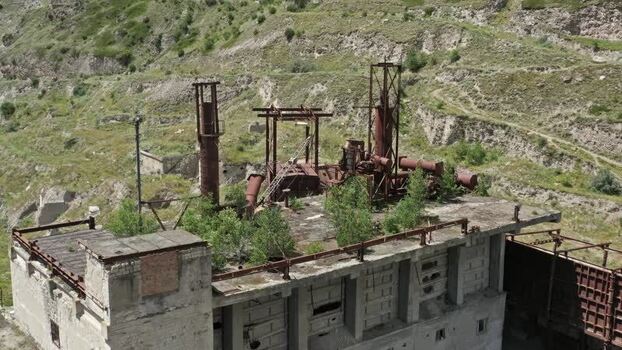 Aerial view of abandoned factory in Caucasus Mountains Russia.