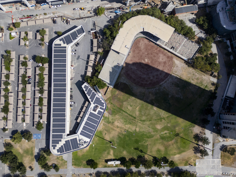 Aerial view of Fundidora Park and Paseo de la Mujer with a modern building featuring solar panels and a baseball field in Monterrey Nuevo Leon Mexico. Aerial view of Fundidora Park and Paseo de la Mujer with a modern building featuring solar panels and a baseball field in Monterrey Nuevo Leon Mexico.