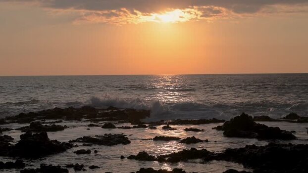 View of a rocky coast at sunset United States.