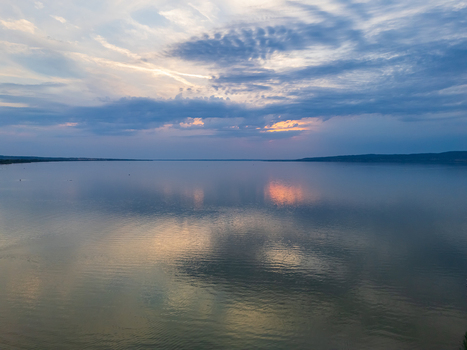Aerial view of Lake Balaton shoreline at blue hour near Balatonfenyves Aerial view of Lake Balaton shoreline at blue hour near Balatonfenyves