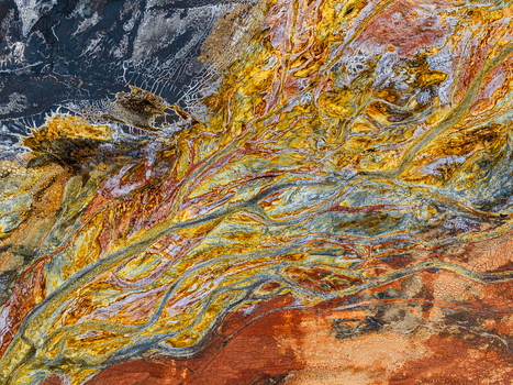 Aerial view of the mineral rich colorful river patterns of the Rio Tinto landscape in Andalusia Spain. Aerial view of the mineral rich colorful river patterns of the Rio Tinto landscape in Andalusia Spain.