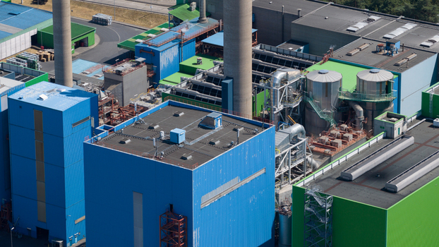 Aerial view of the Abfallkraftwerk Herten waste to energy plant with complex industrial piping chimneys and metal structures Herten Nordrhein Westfalen Germany.