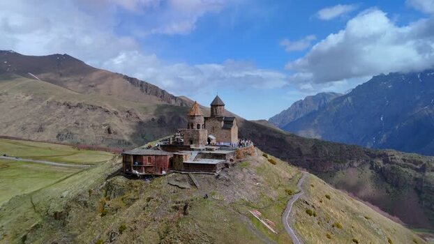 Aerial view of Gergeti Trinity Church in the mountains Georgia.