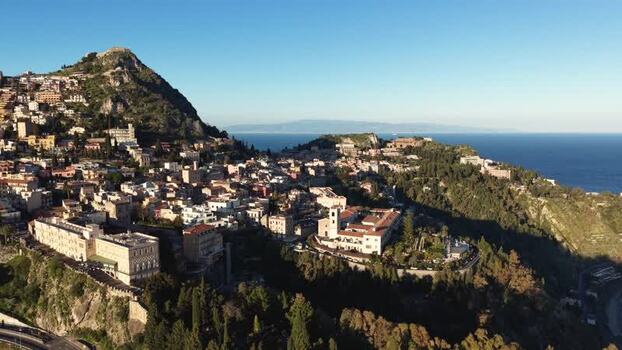 Aerial view of the historic town of Taormina and the sea Italy.