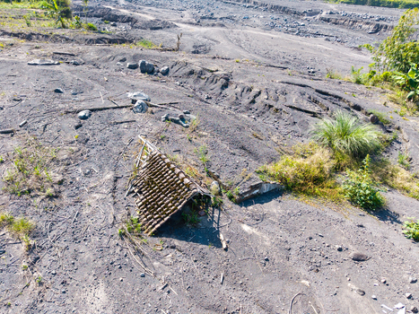 Aerial view of the volcanic ash and debris covering the landscape in the aftermath of the Mount Semeru eruption in Supiturang Village Pronojiwo East Java Indonesia.
