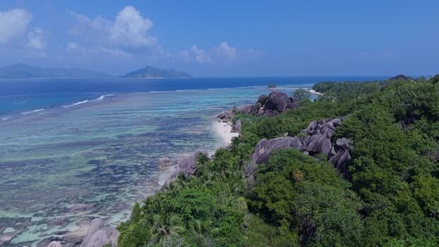 Aerial view of Anse Reunion granite boulders Seychelles.