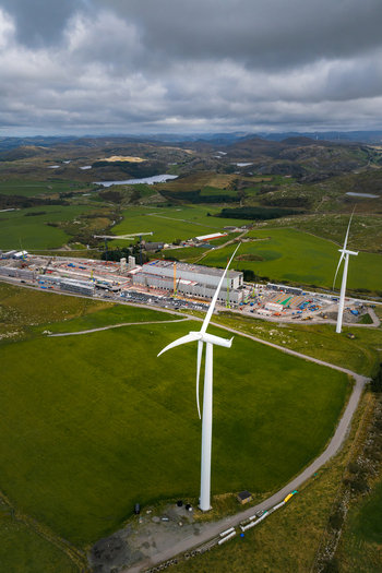 Aerial view of the Green Mountain SVG Undheim Datasenter construction site surrounded by wind turbines and green fields in Undheim Rogaland Norway. Aerial view of the Green Mountain SVG Undheim Datasenter construction site surrounded by wind turbines and green fields in Undheim Rogaland Norway.