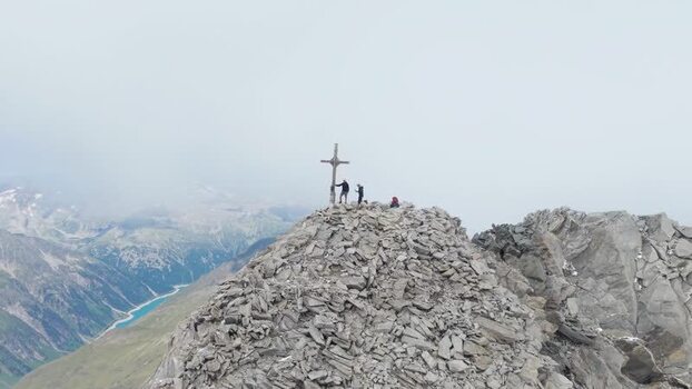 Aerial view of Grosser Moseler summit with hikers Austria.