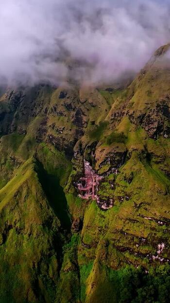 Aerial view of lush green mountains in Bali Indonesia.