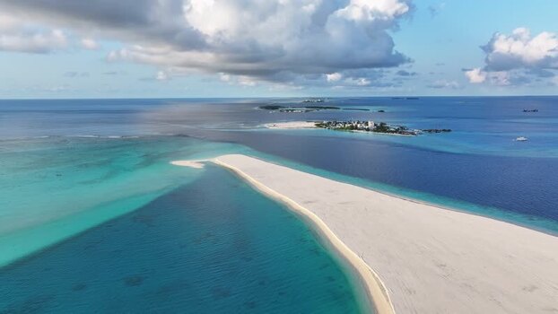 Aerial view of a Rasmale Project and turquoise waters Maldives. Aerial view of a Rasmale Project and turquoise waters Maldives.