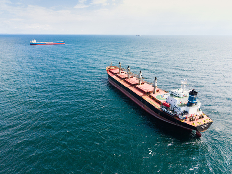 Aerial view of large cargo ships navigating the calm blue waters of the Black Sea near Varna Varna Bulgaria. Aerial view of large cargo ships navigating the calm blue waters of the Black Sea near Varna Varna Bulgaria.