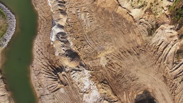 Aerial view of a sand quarry and river Germany.